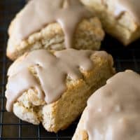 Small batch of maple scones on a wire rack.