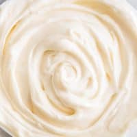 Small-batch cream cheese frosting in a glass bowl.