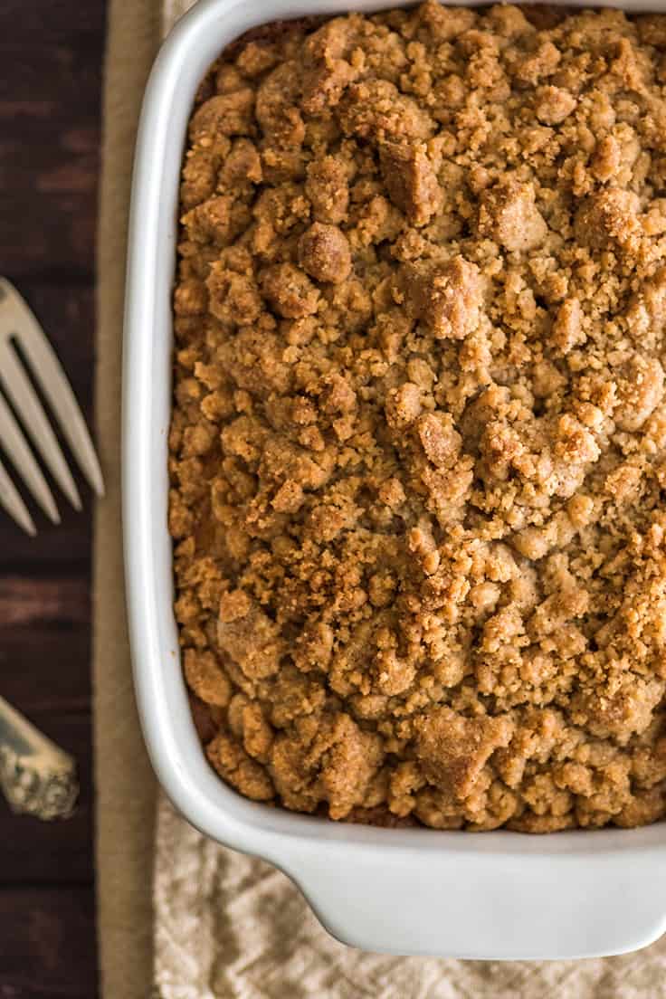 Small coffee cake with streusel in a baking dish.