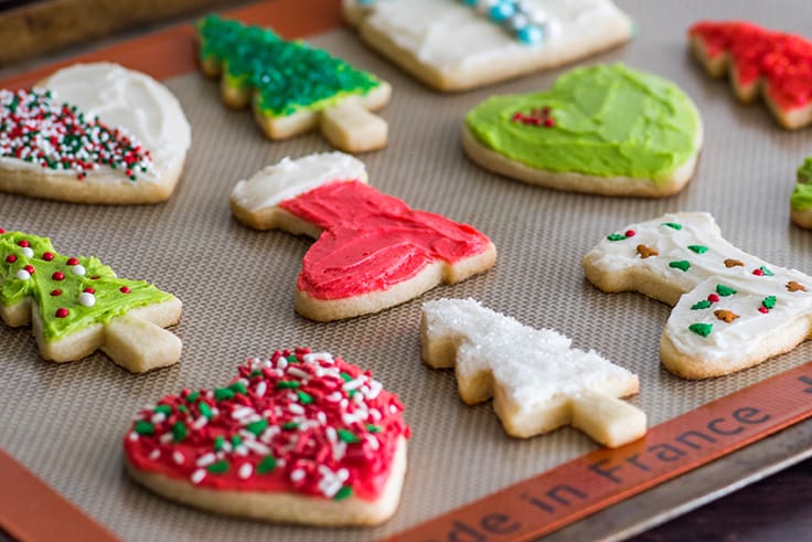 Tray of decorated sugar cookies for Christmas.