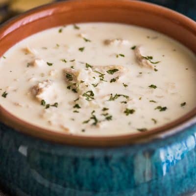 Photo of Keto Chicken Soup in blue bowl.