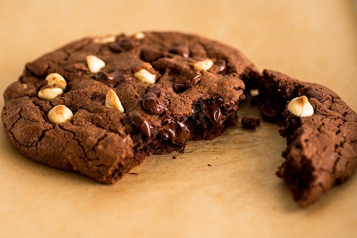 Photo of One Triple Chocolate Cookie for Two broken into two pieces.