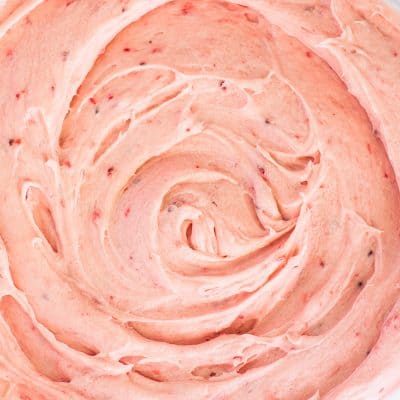 Overhead photo of small-batch strawberry frosting in a glass bowl.