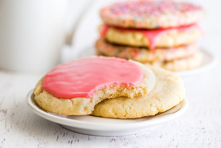 Small-batch Sugar Cookie with glaze and a bite taken out of it.