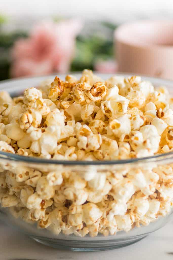 Brown Sugar Kettle Corn is kettle corn’s slightly more fun and mature sibling. Salty, sweet, and just a bit caramelly, it’s perfect for movie night or an afternoon snack. | #snack | #kettlecorn | #brownsugar | Close up photo of Brown Sugar Kettle Corn in a bowl.