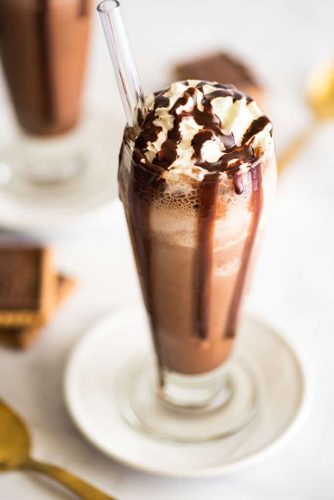 Picture of frozen hot chocolate with whipped cream and chocolate fudge sauce