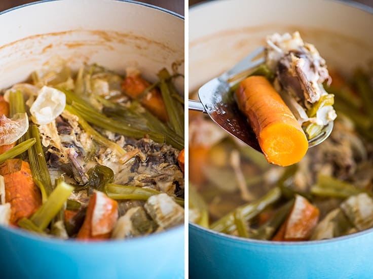 Picture of homemade chicken stock bones and vegetables after being simmered.