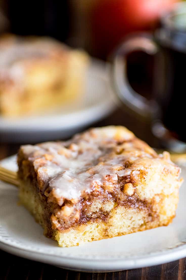 Picture of slice of Small Apple Cinnamon Cake on a white plate.