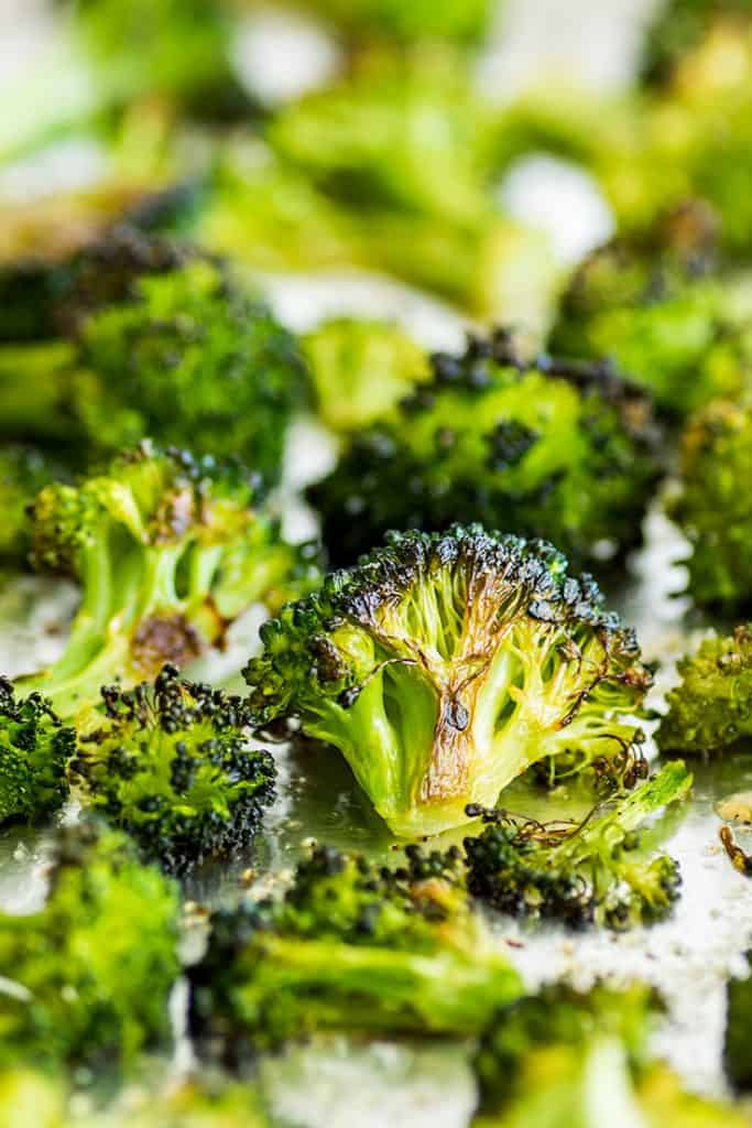 Picture of crispy oven-roasted broccoli on a baking sheet.