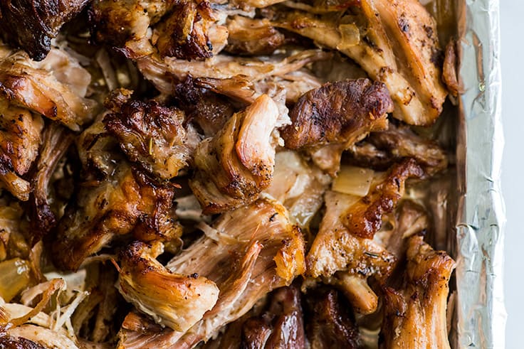 Close up photo of crispy homemade carnitas for carnitas nacho fries.