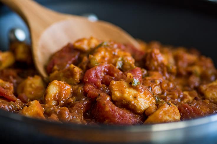 This easy chicken curry is an all-time favorite in my family and a super quick and simple weeknight meal. | #chickencurry | #chicken | #bonelessskinlesschickenbreasts | Picture of Easy Chicken Curry in pan.