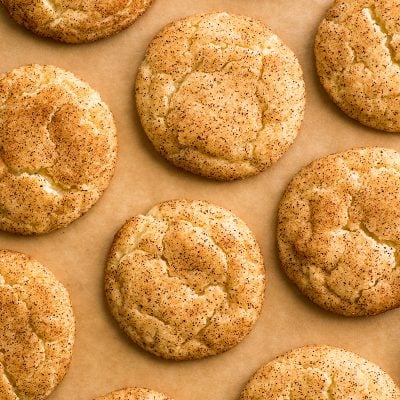 Overhead photo of Snickerdoodle Cookies on parchment paper.