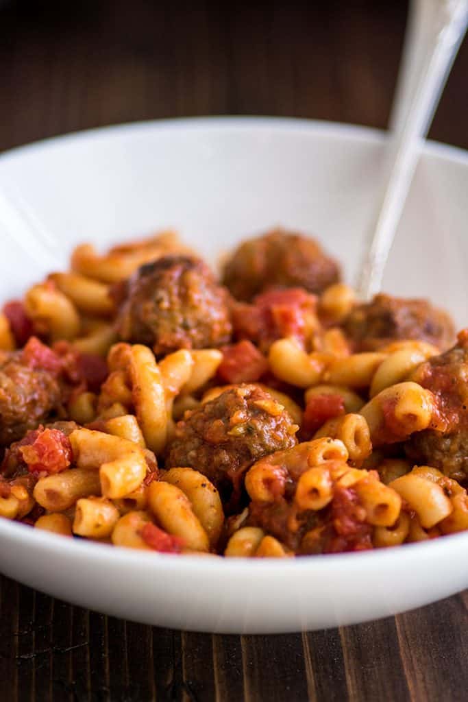 Photo of Homemade Spaghettios in a white bowl.