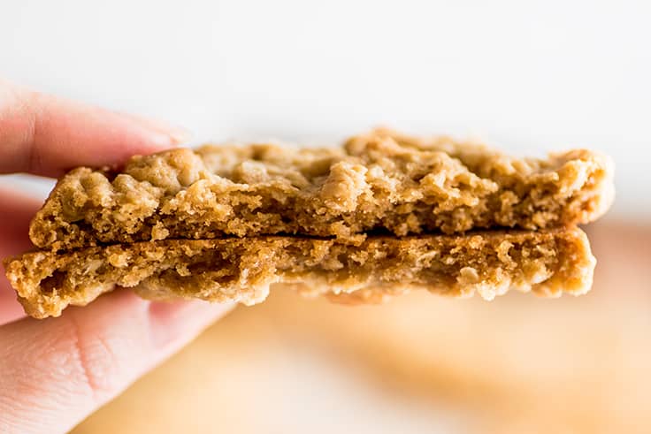 Close up photo of Peanut Butter Oatmeal Cookie split in two.