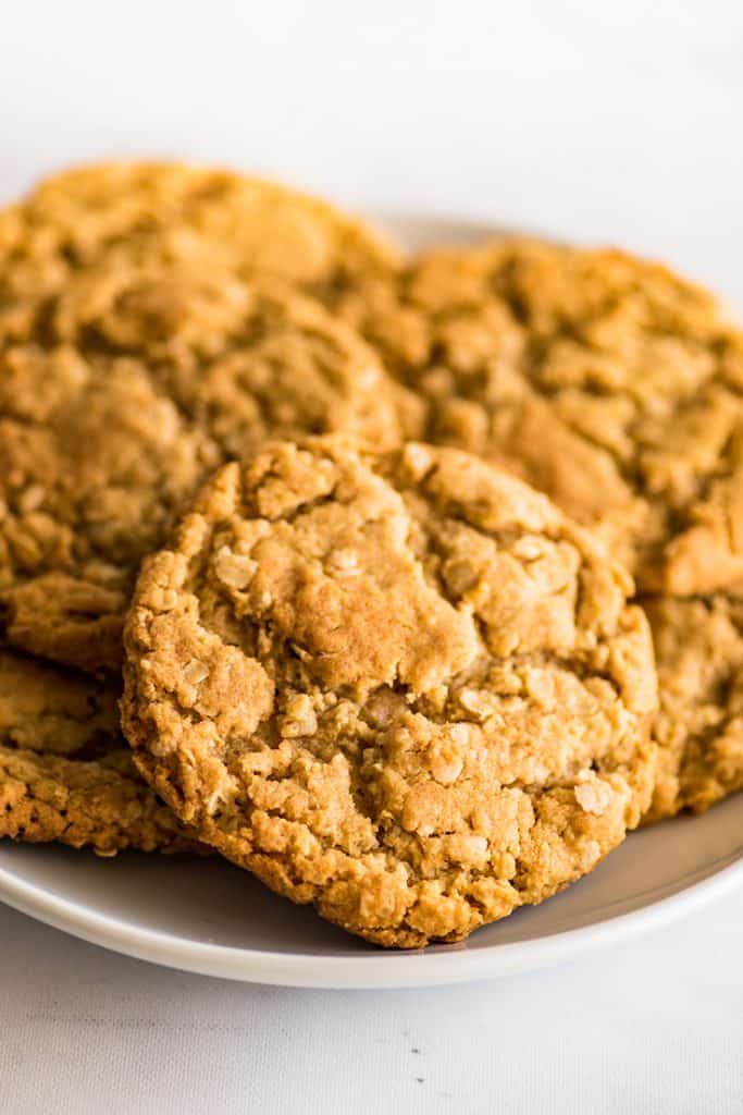 Pile of Small-batch Peanut Butter Oatmeal Cookies of a white plate.
