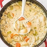 Easy Creamy Chicken Noodle Soup in a pot.