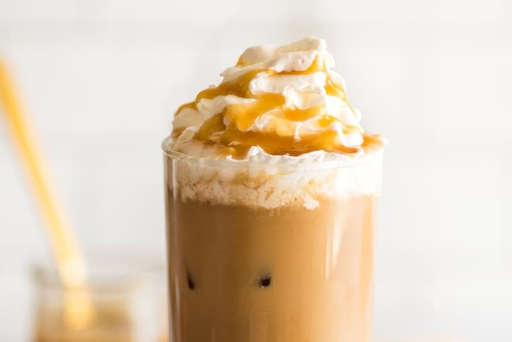 Iced Caramel Macchiato with whipped cream.