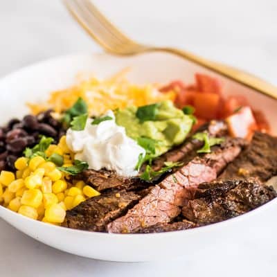 Photo of Carne Asada Burrito Bowl in a white bowl.