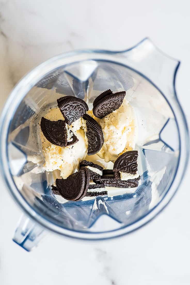 Oreo milkshake ingredients in a blender.