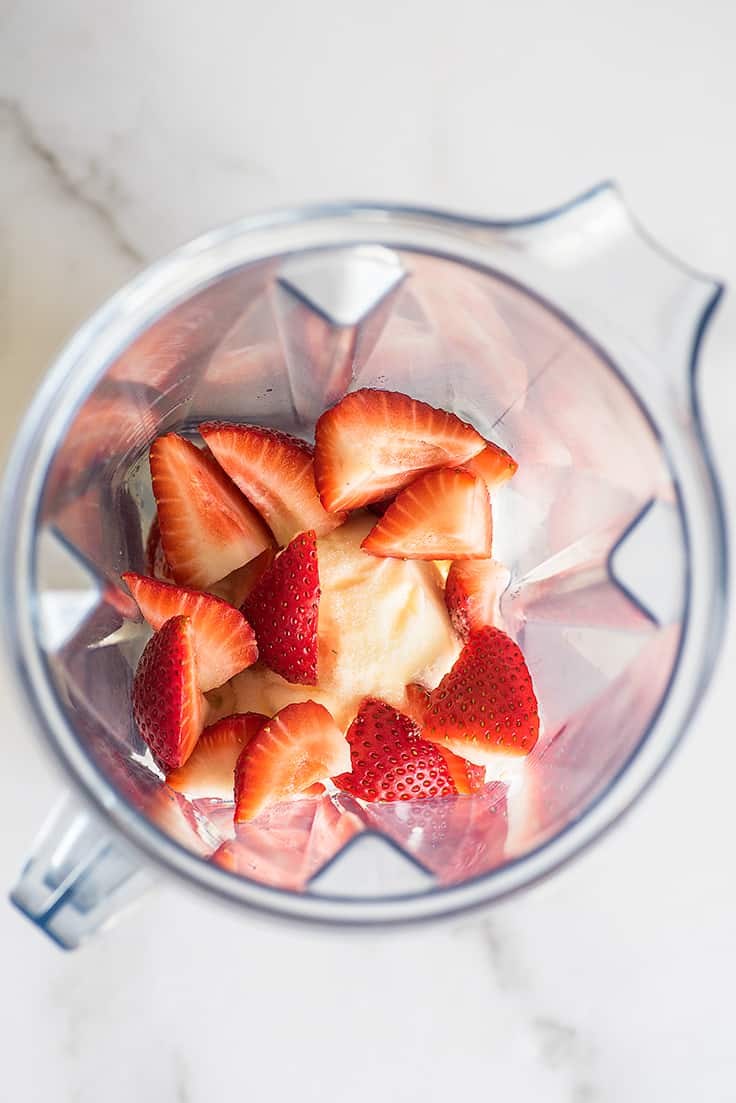 Strawberry Milkshake ingredients in a blender