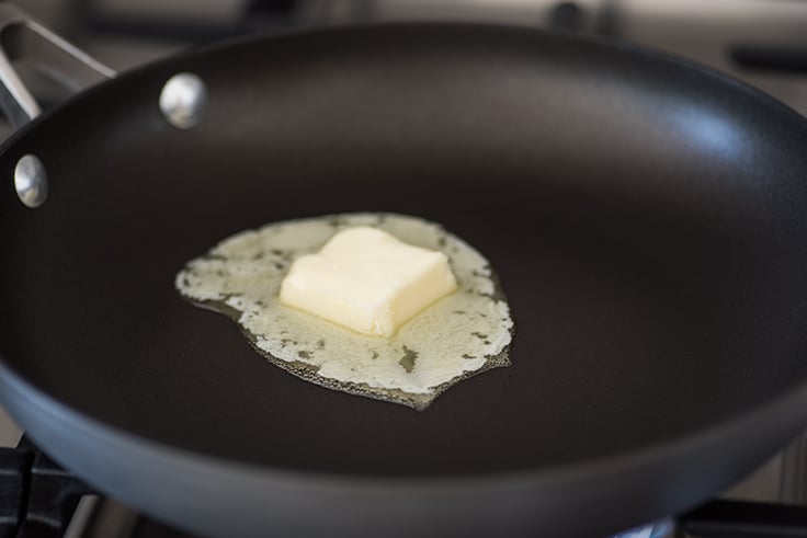 Melting butter on the stove.