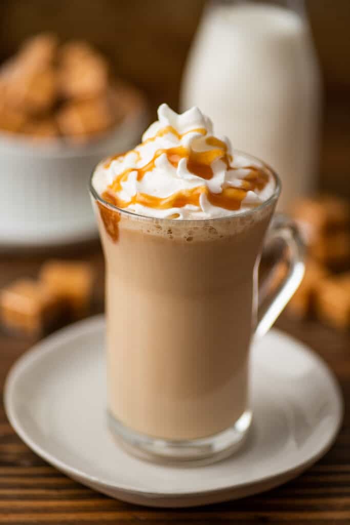 Caramel latte in a glass cup.