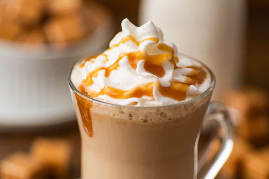 Close up photo of a caramel latte.
