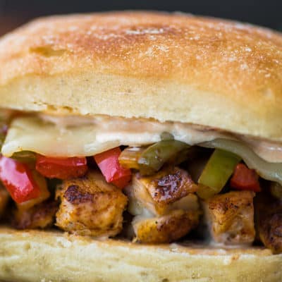 Close-up photo of chicken fajita sandwich.