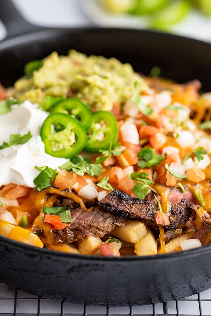 Carne Asada Fries in a skillet.