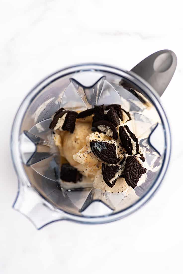 Bailey's cookies and cream shake being made in a blender.