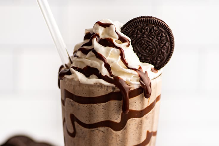 Bailey's cookies and cream milkshake with whipped cream and fudge sauce.