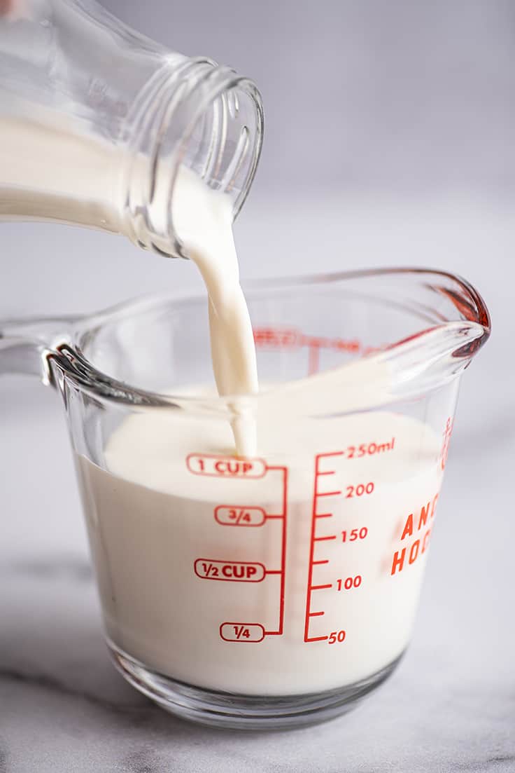 Photo of leftover half and half being poured into a glass.