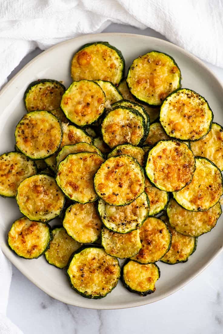 Overhead photo of baked parmesan zucchini on a plate.