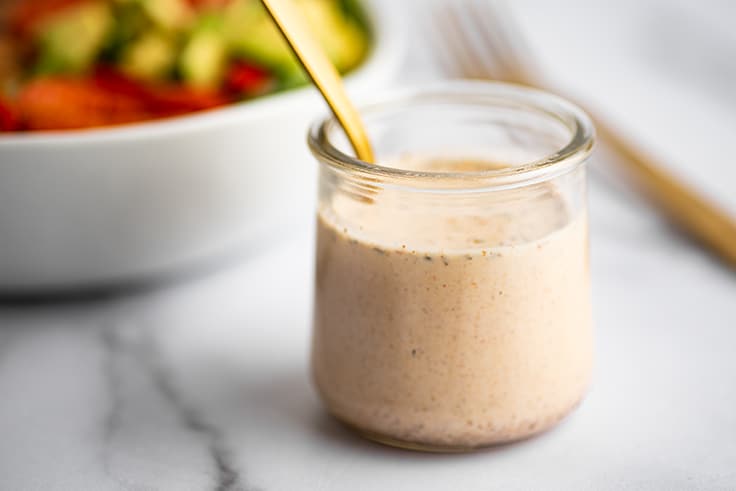 Fajita salad dressing in a glass jar.