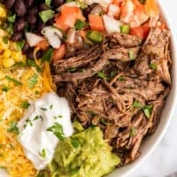 Close up overhead photo of a barbacoa burrito bowl.