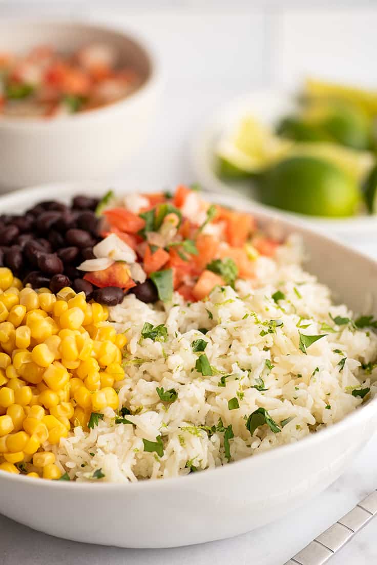 Burrito bowl in a white bowl.