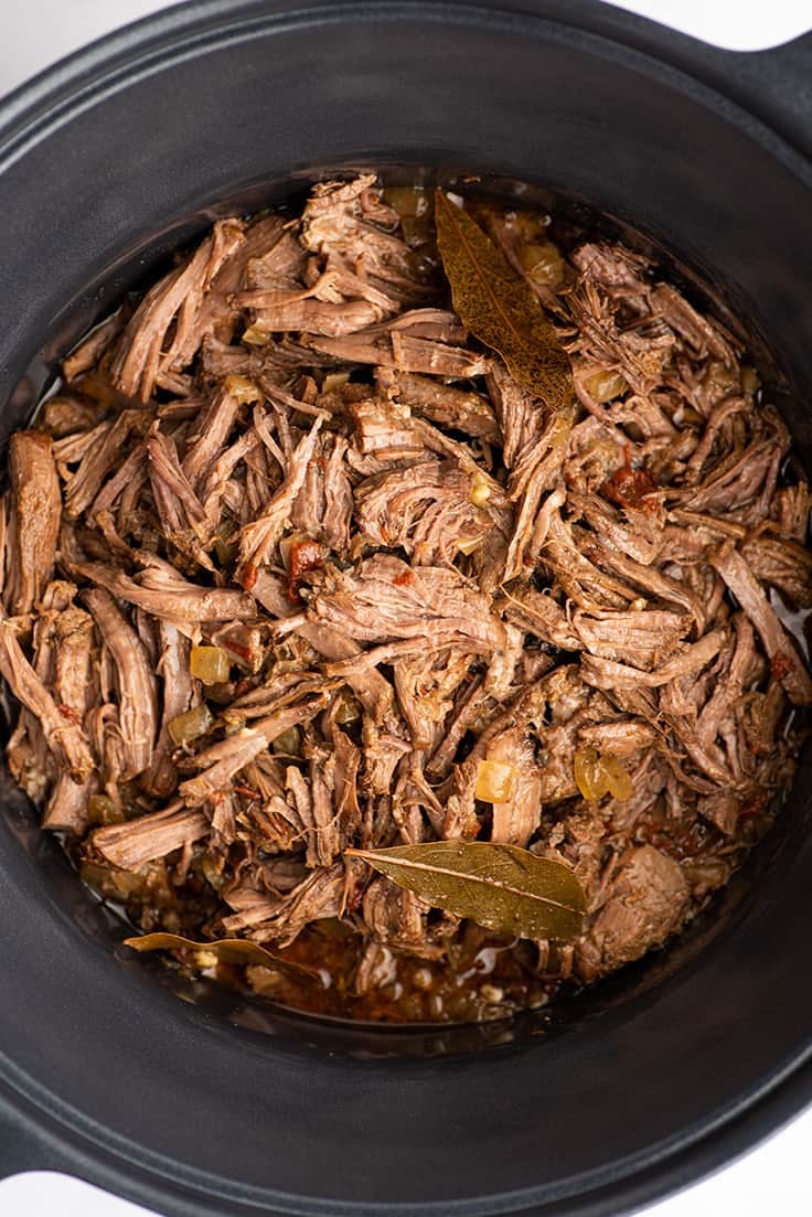 Beef barbacoa in a crock pot.