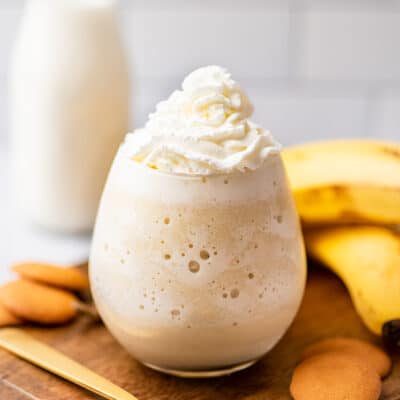 Banana milkshake without ice cream in a glass cup.