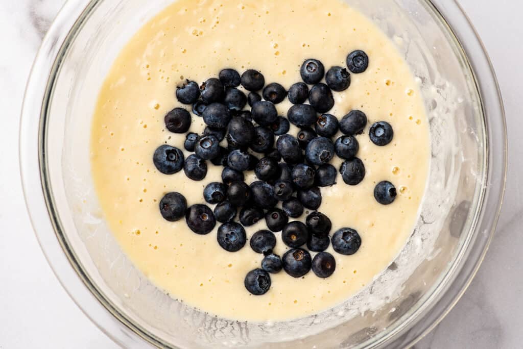 Blueberries in waffle batter.