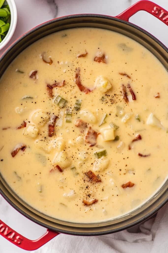 Potato bacon soup in a pot.