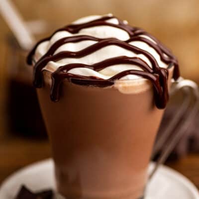 Baileys hot chocolate with whipped cream and fudge drizzle.