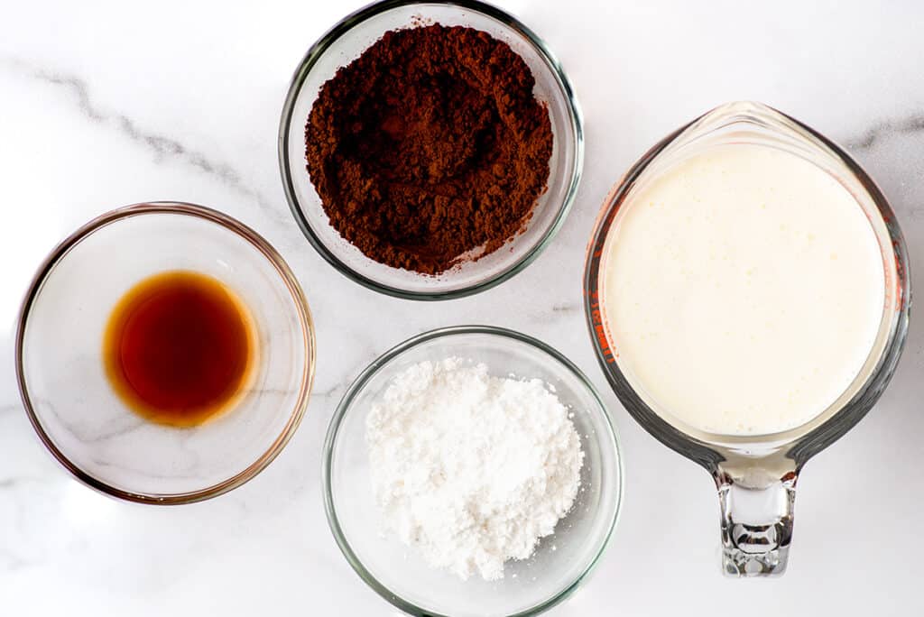 Chocolate whipped cream ingredients on a counter.