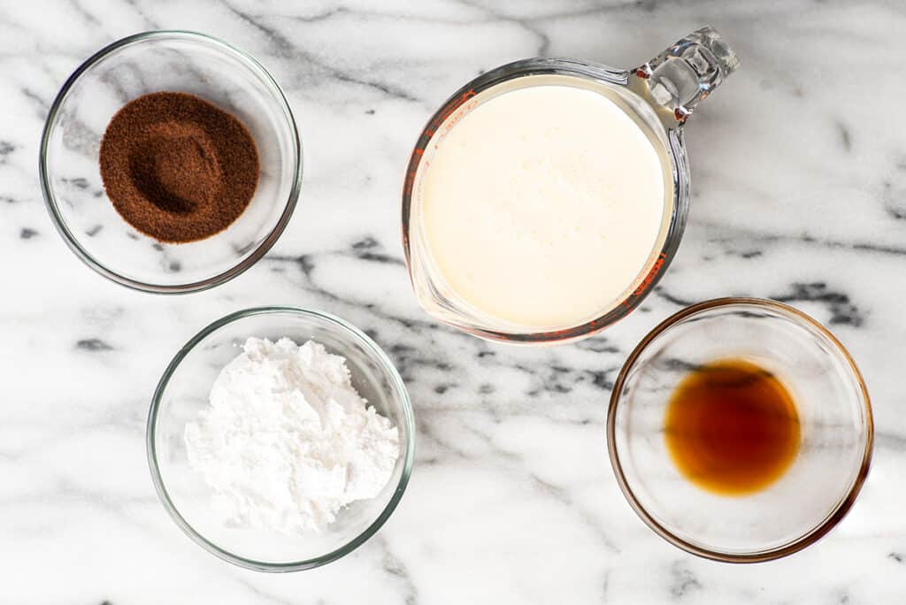 Coffee whipped cream ingredients on a counter.