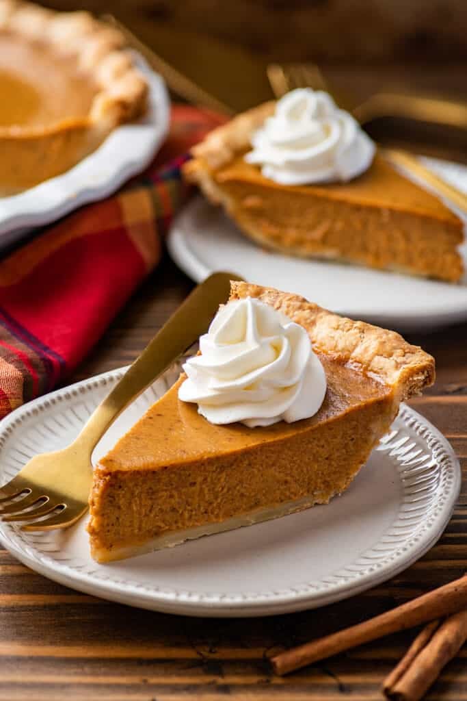 The best pumpkin pie sliced on a plate.