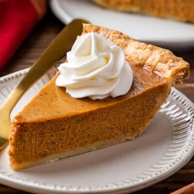 The best pumpkin pie sliced on a plate.