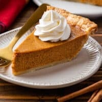 The best pumpkin pie sliced on a plate.