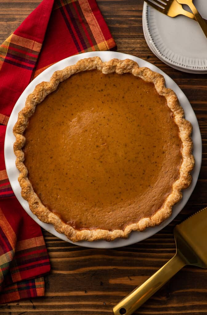 Pumpkin pie on a table.