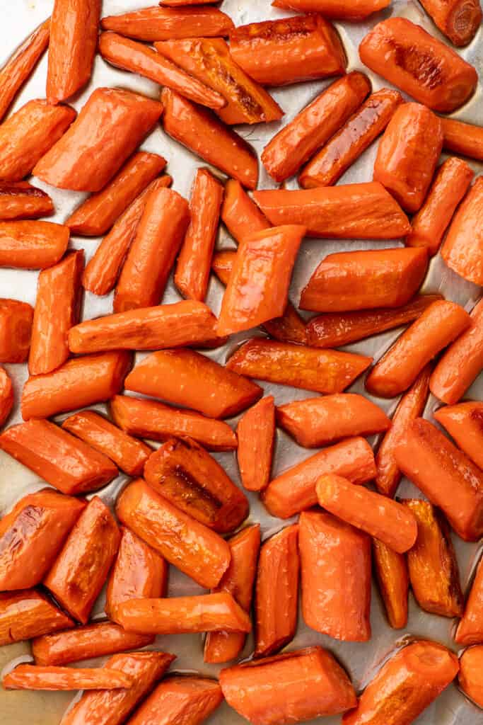 Honey butter carrots on a baking sheet.