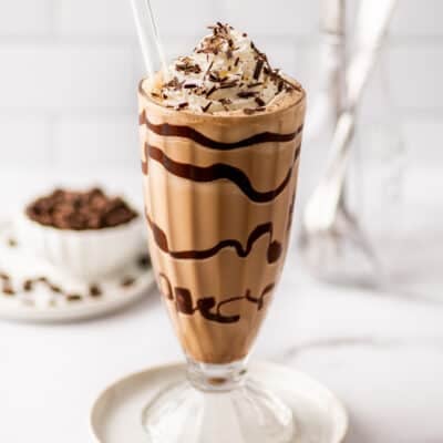 Coffee milkshake in a glass cup.