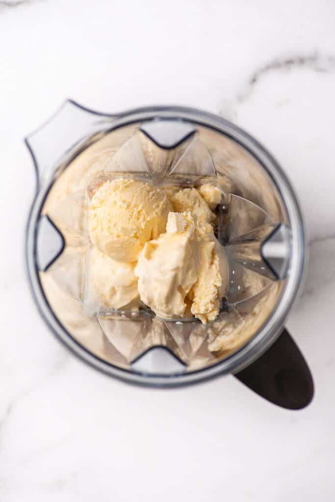 Coffee milkshake ingredients in a blender.